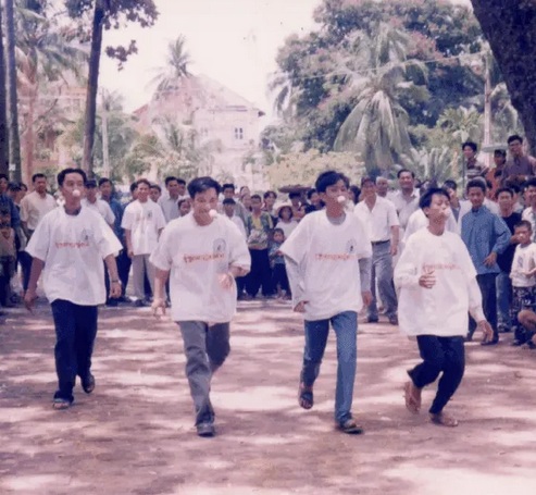 Students walk to Ankor Wat as a sign of solidarity and connection to Cambodia's rich history (1994)
